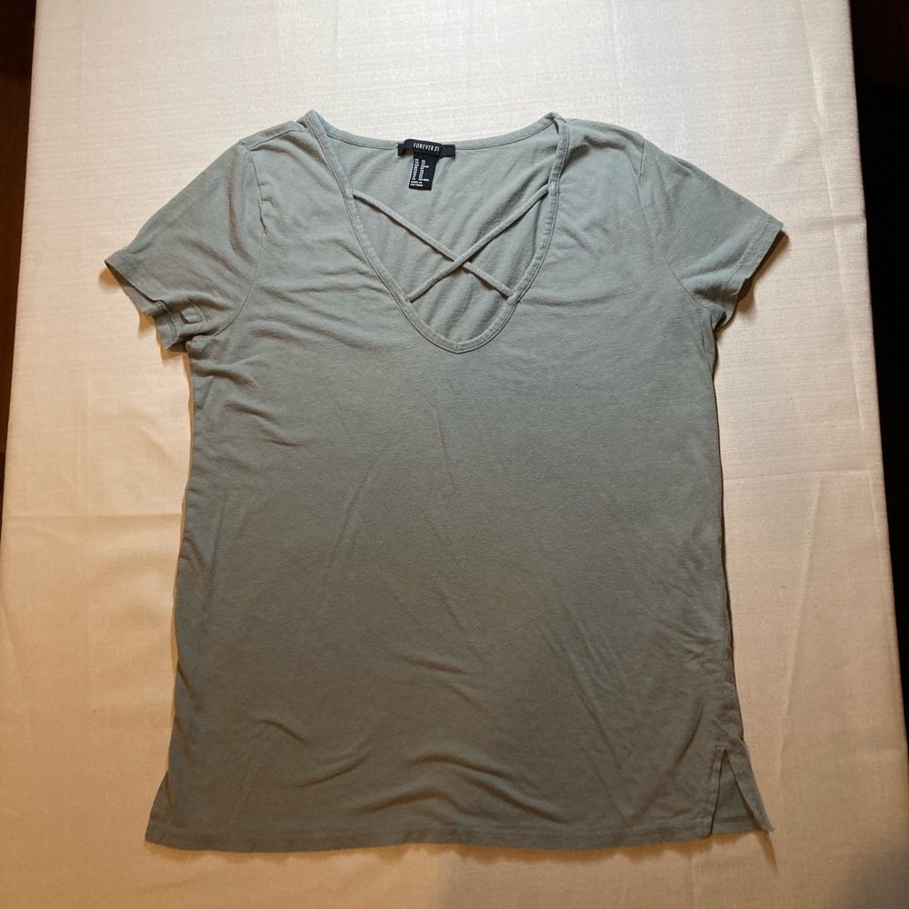 Forever 21. Cute T-shirt size XS. Criss cross design over V neck. Olive green.